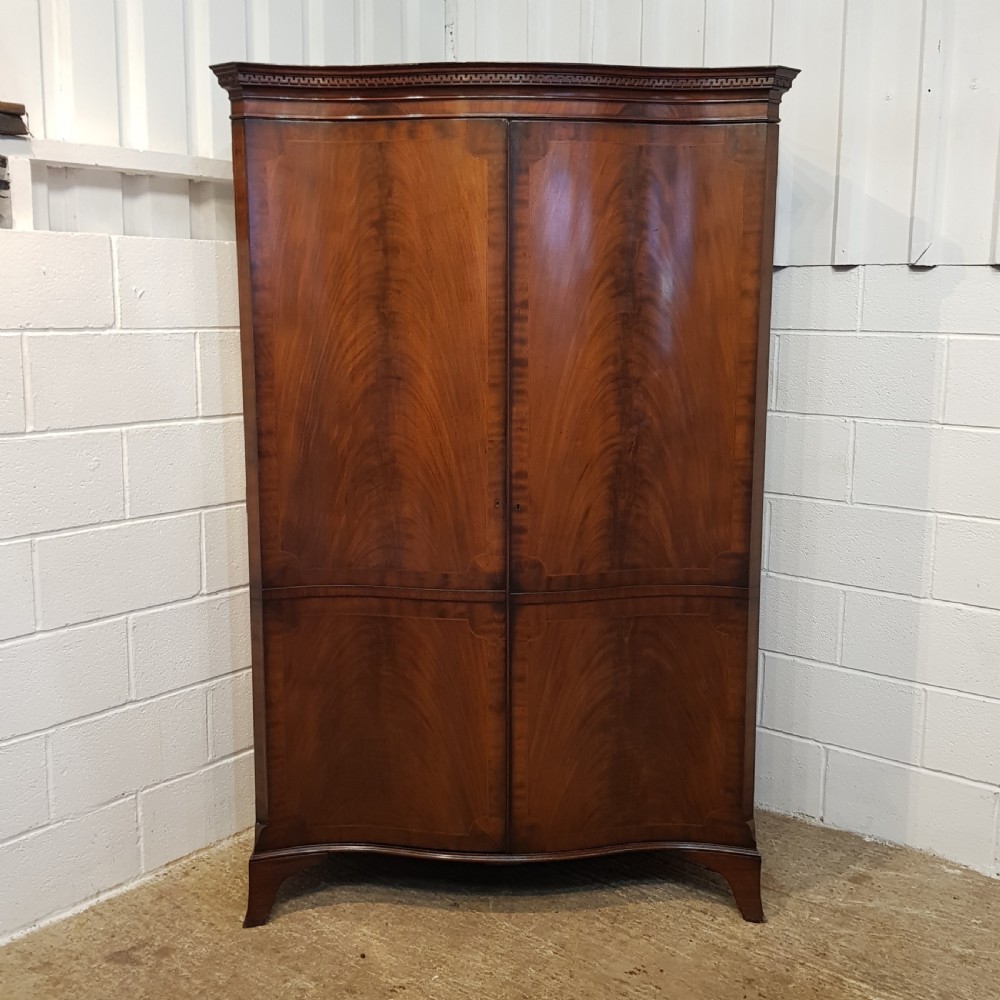 ANTIQUE MAHOGANY SERPENTINE FRONT MAHOGANY DOUBLE WARDROBE C1910 View V
