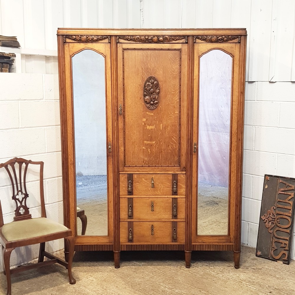 ANTIQUE FRENCH CARVED  OAK TRIPLE WARDROBE C1920