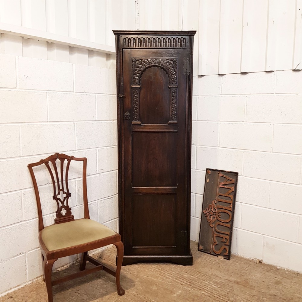ANTIQUE TALL CARVED OAK CUPBOARD C1910