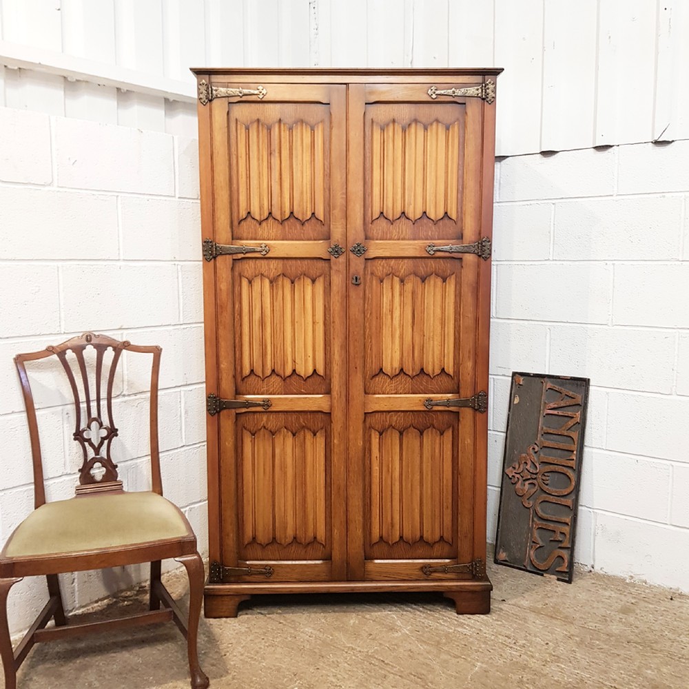 ANTIQUE OAK LINEN FOLD FITTED WARDROBE C1920