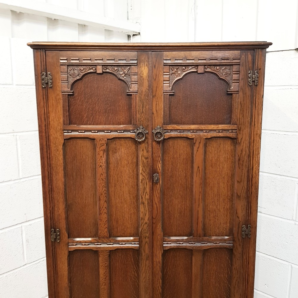 ANTIQUE CARVED OAK SMALL FITTED WARDROBE 61” HIGH C1920 View III