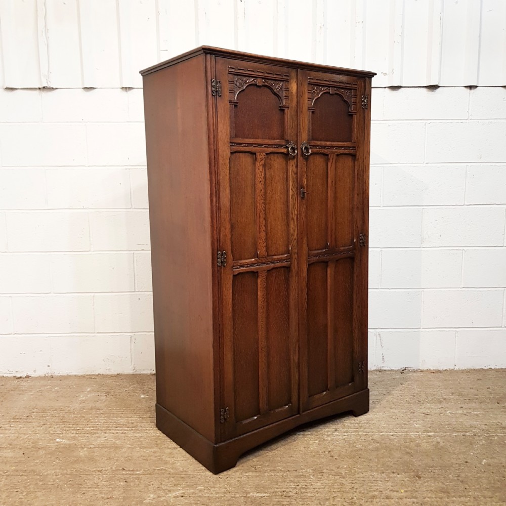 ANTIQUE CARVED OAK SMALL FITTED WARDROBE 61” HIGH C1920 View V