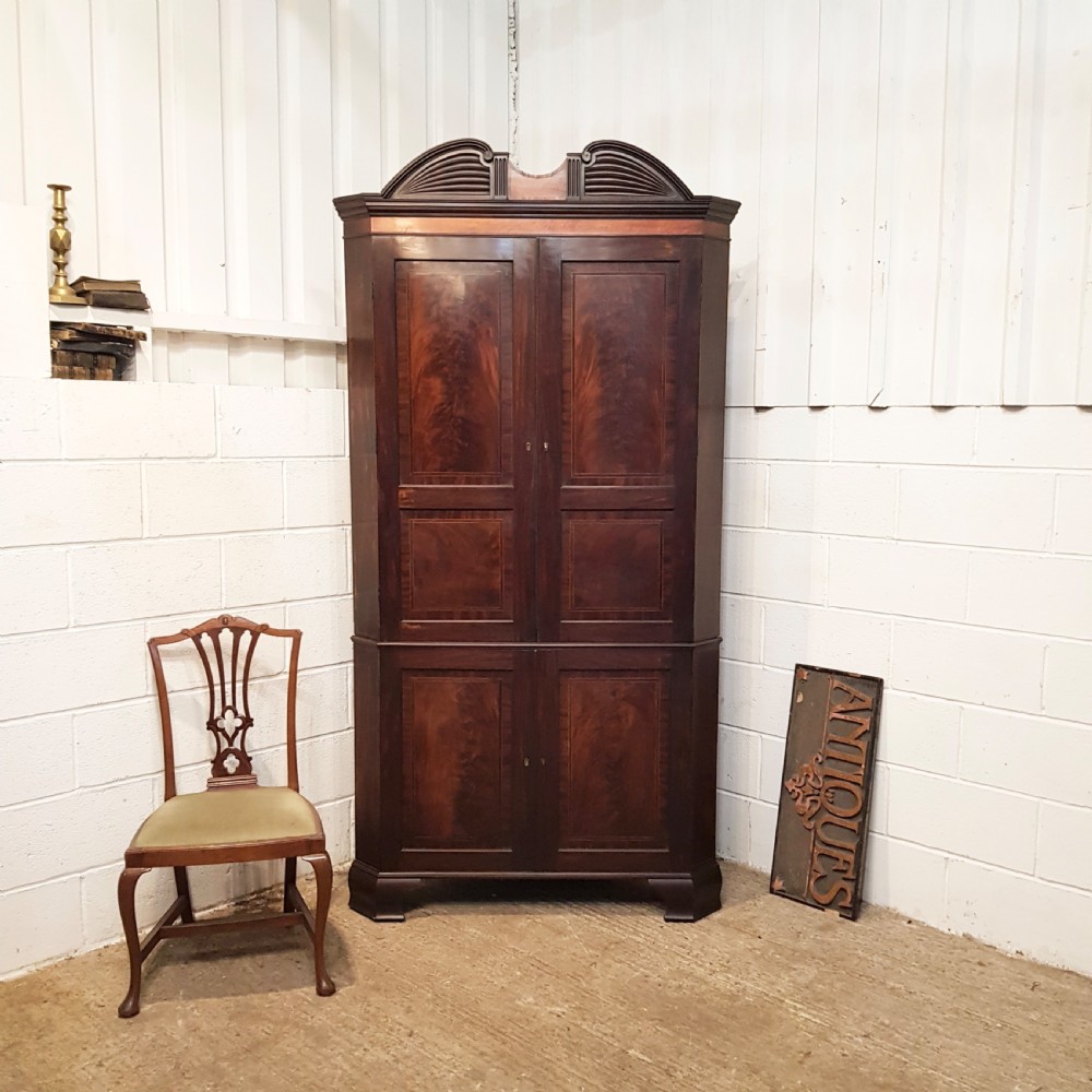 ANTIQUE REGENCY FLAMED MAHOGANY FULL HEIGHT CORNER CUPBOARD C1820