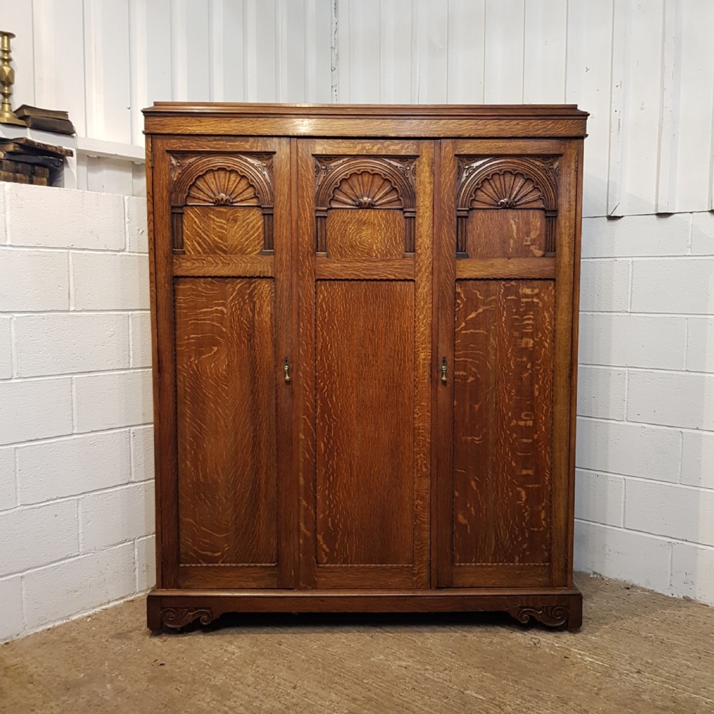 ANTIQUE CARVED OAK SMALL TRIPLE WARDROBE C1920 View II