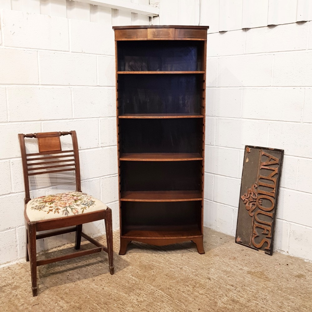 ANTIQUE TALL MAHOGANY BOW FRONT OPEN BOOKCASE C1920