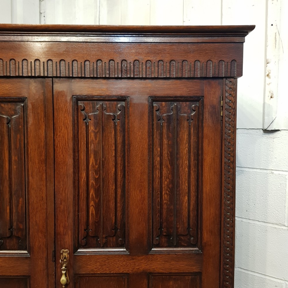 ANTIQUE SMALL OAK LINEN FOLD TRIPLE WARDROBE BY WARING & GILLOWS C1920 View IV