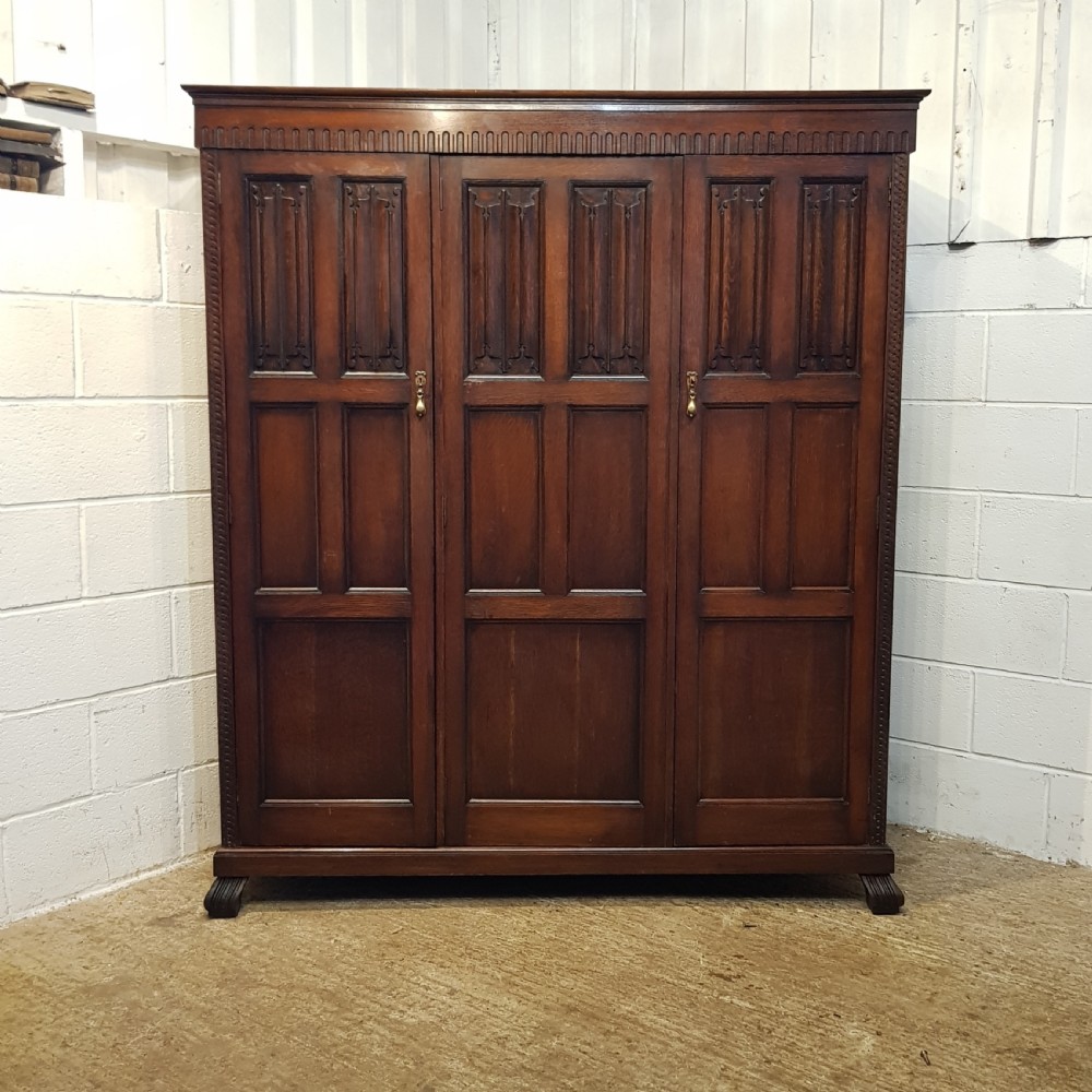 ANTIQUE SMALL OAK LINEN FOLD TRIPLE WARDROBE BY WARING & GILLOWS C1920 View VI