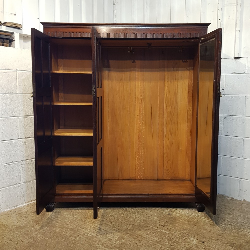 ANTIQUE SMALL OAK LINEN FOLD TRIPLE WARDROBE BY WARING & GILLOWS C1920 View VII