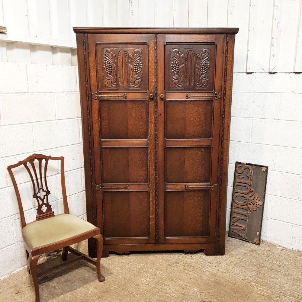 ANTIQUE CARVED OAK DOUBLE WARDROBE  C1920