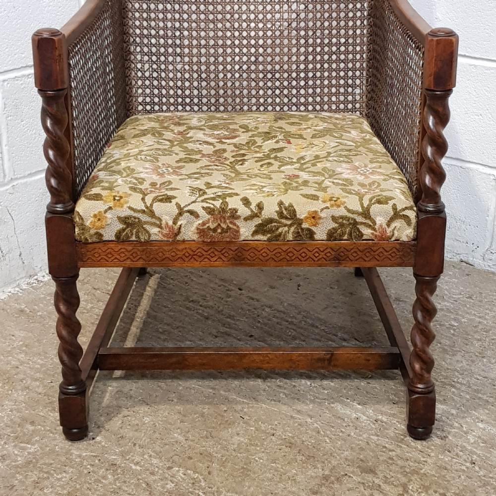 ANTIQUE WALNUT & OAK FRAMED BERGERE ARMCHAIR C1920 View II