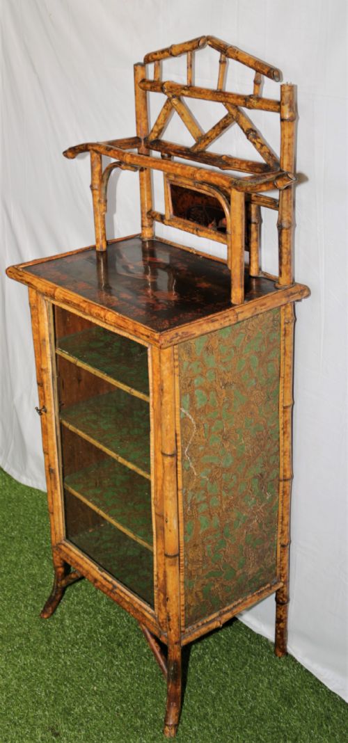 A Victorian Bamboo Music Cabinet.