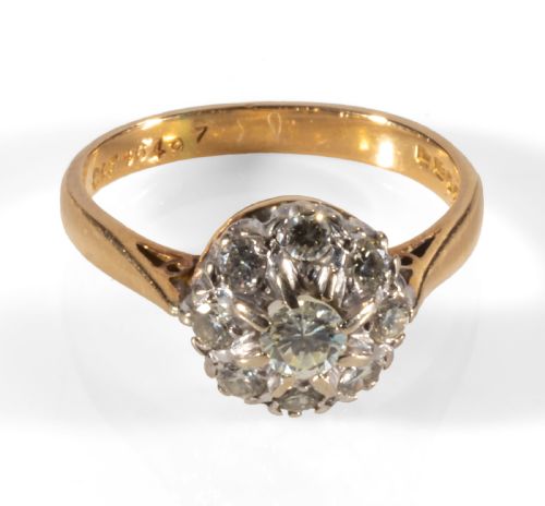 A Diamond Daisey Flower Head Ring.