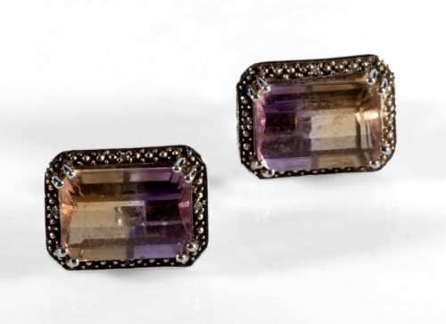 Amatreen and Gold Ear Rings.