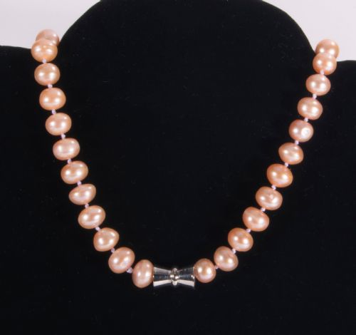 A String of Dyed Pink Pearls.