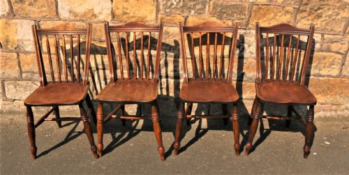 A Set of 4 Kitchen Chairs.