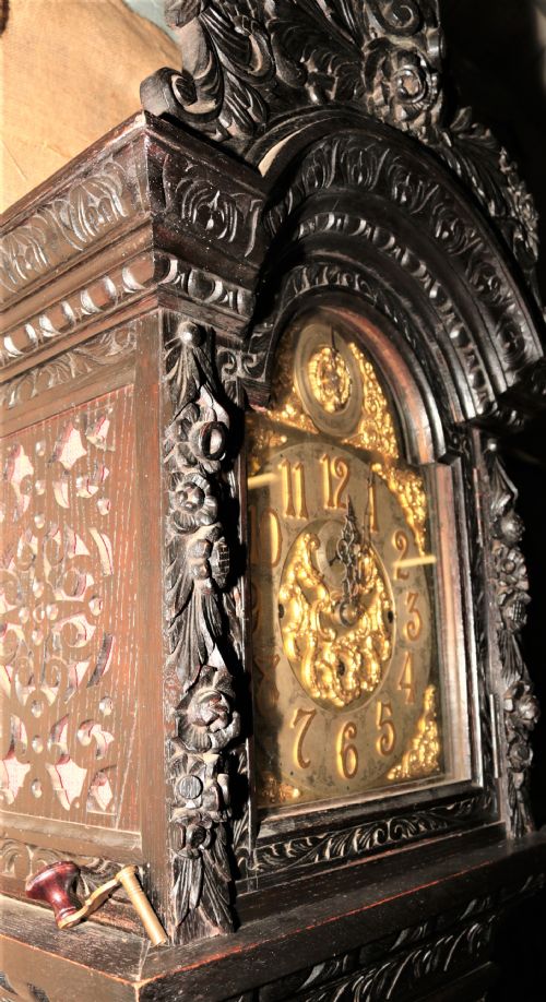 fig 1. Carved oak grandfather clock.