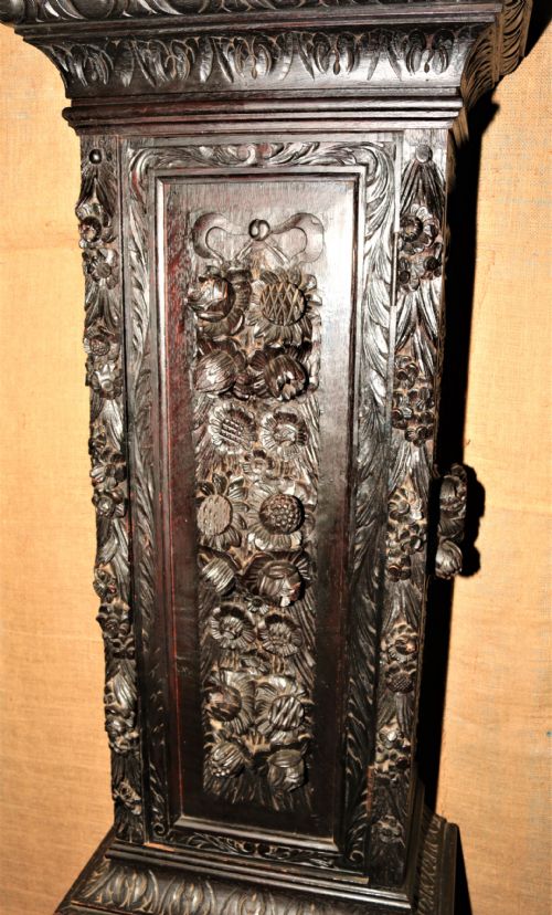 fig 2. Carved oak grandfather clock.