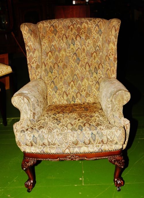 An Edwardian Wingback Armchair.