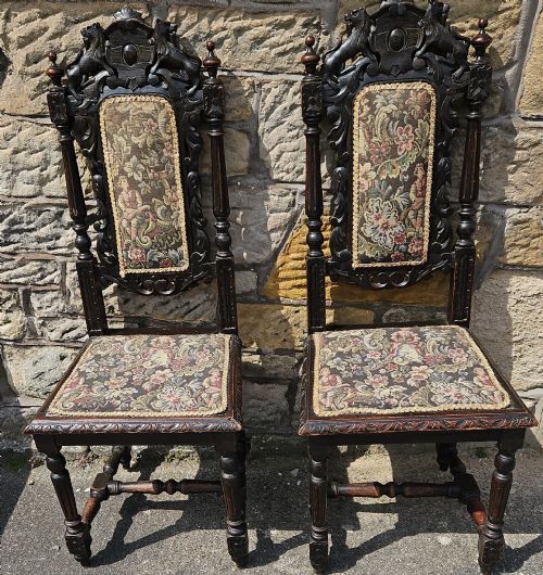 A Pair of Victorian Carved Oak Chairs