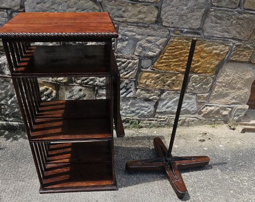 AN EDWARDIAN OAK REVOLVING BOOKCASE
