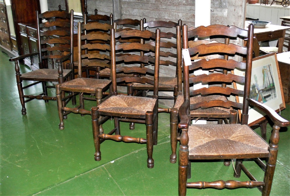 SET of 8 Lancashire ladder back chairs.