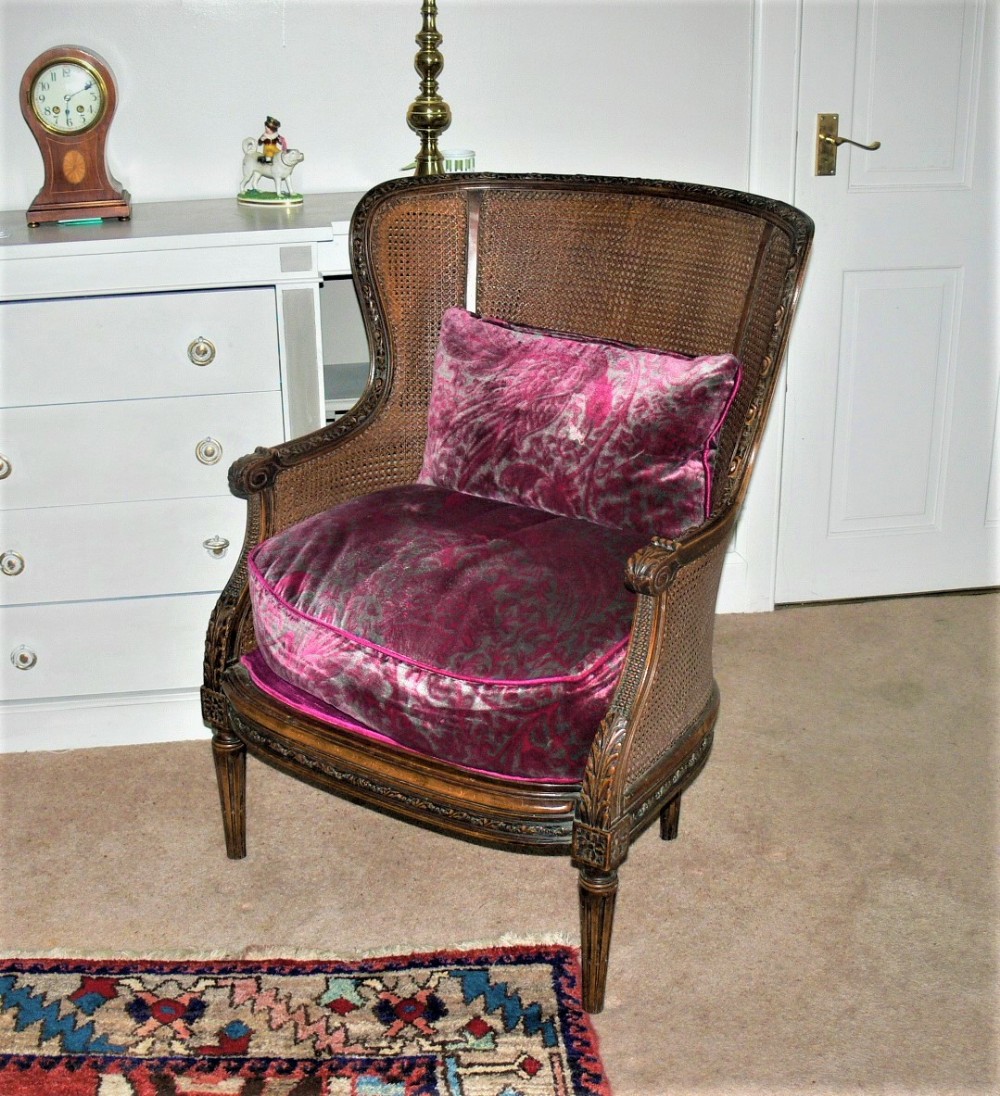 Walnut Bergere chair.