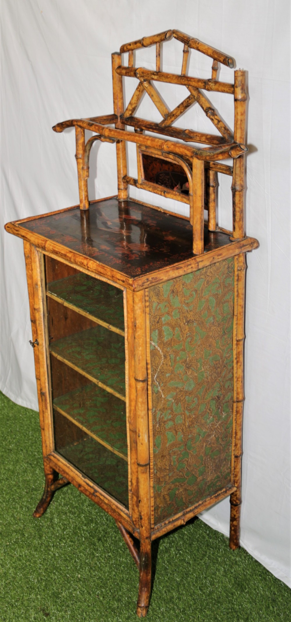 A Victorian bamboo music cabinet.