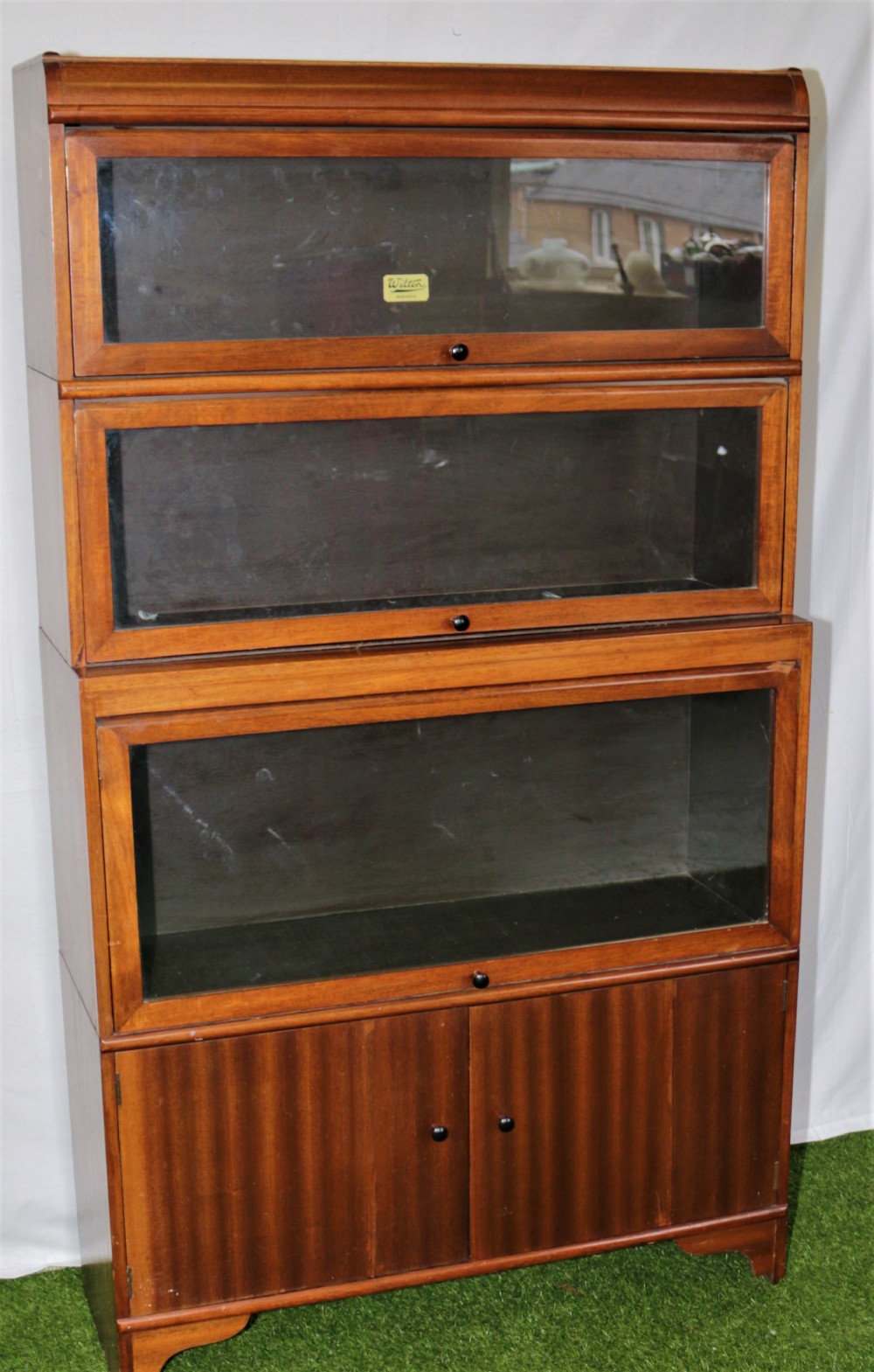 A pair of stacking bookcases.