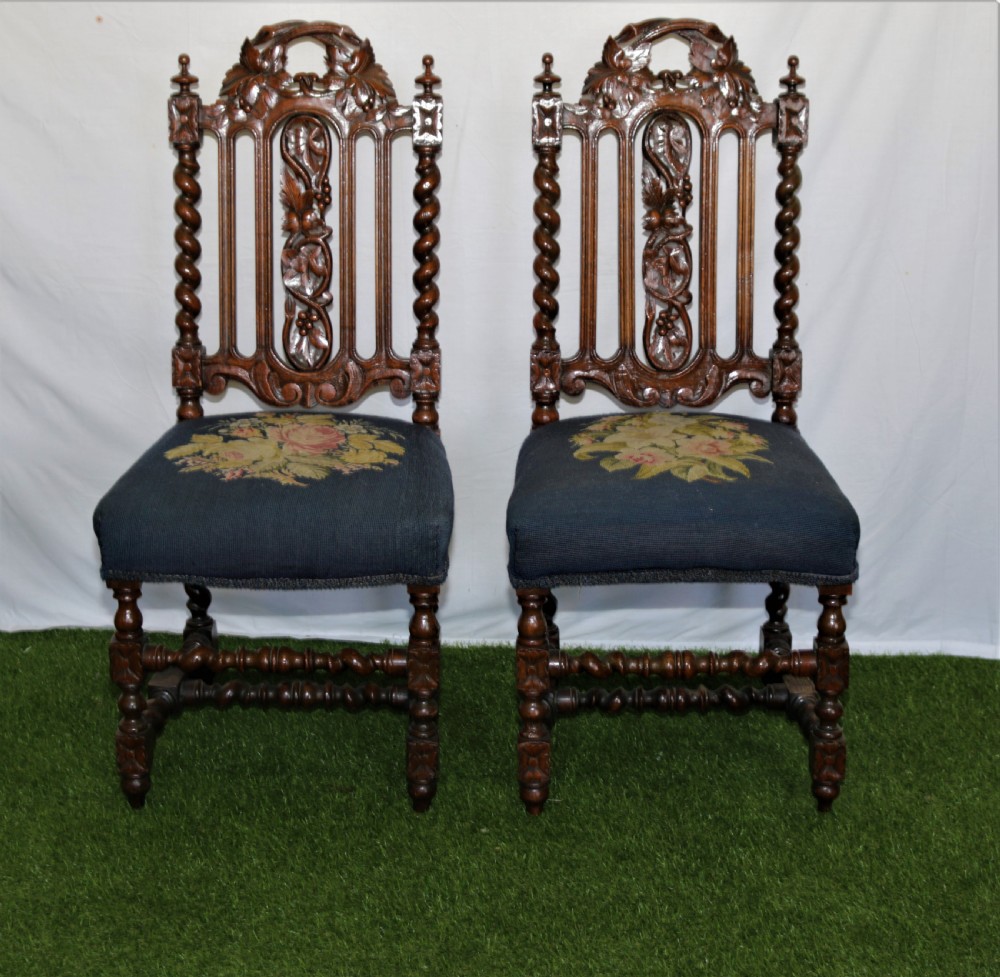 Apair of Victorian side or hall chairs.