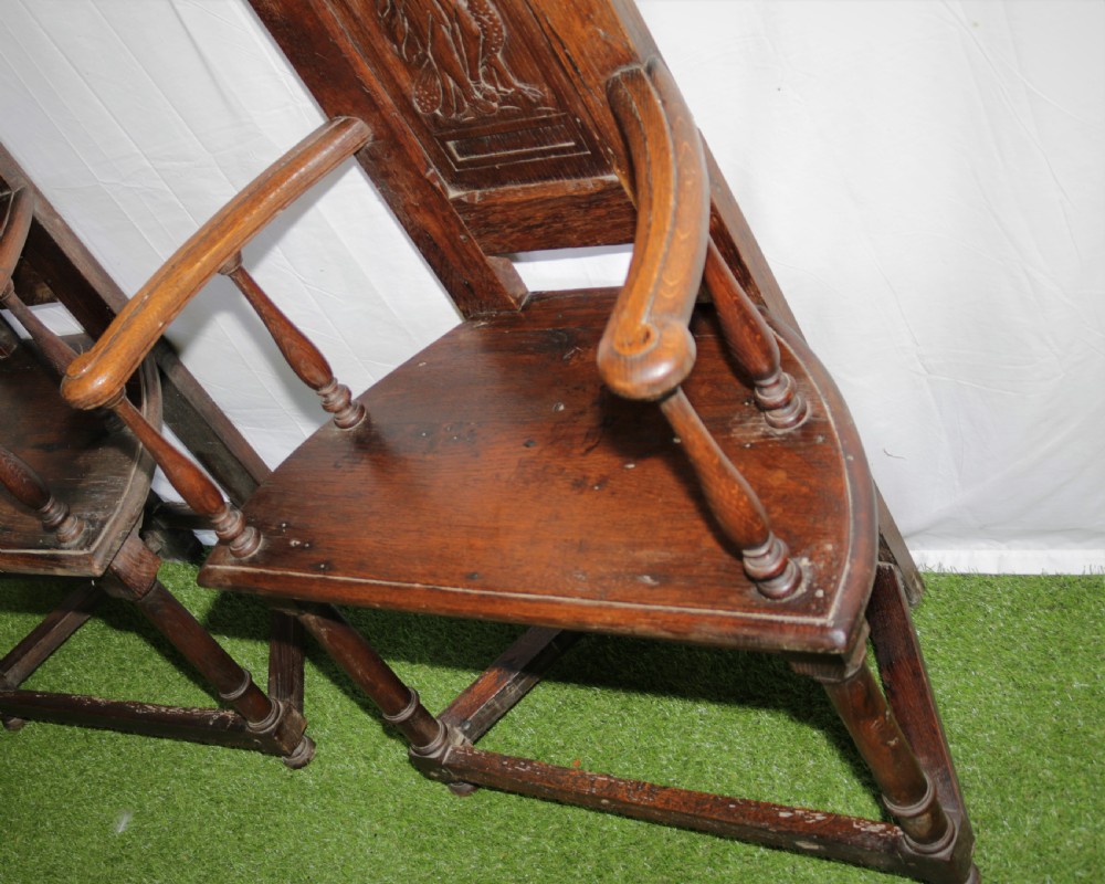 A pair of early  oak chairs View VI