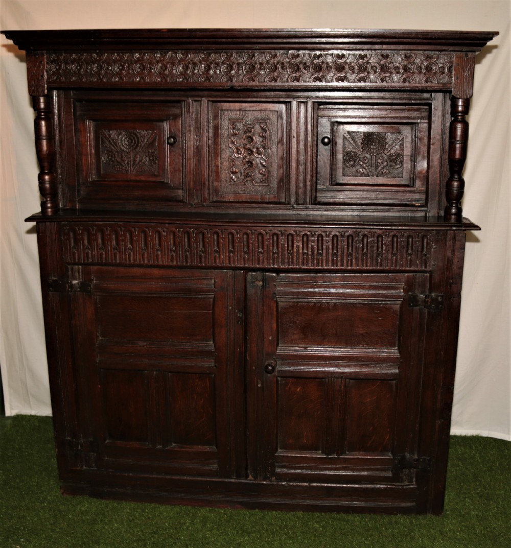 Period oak court cupbourd