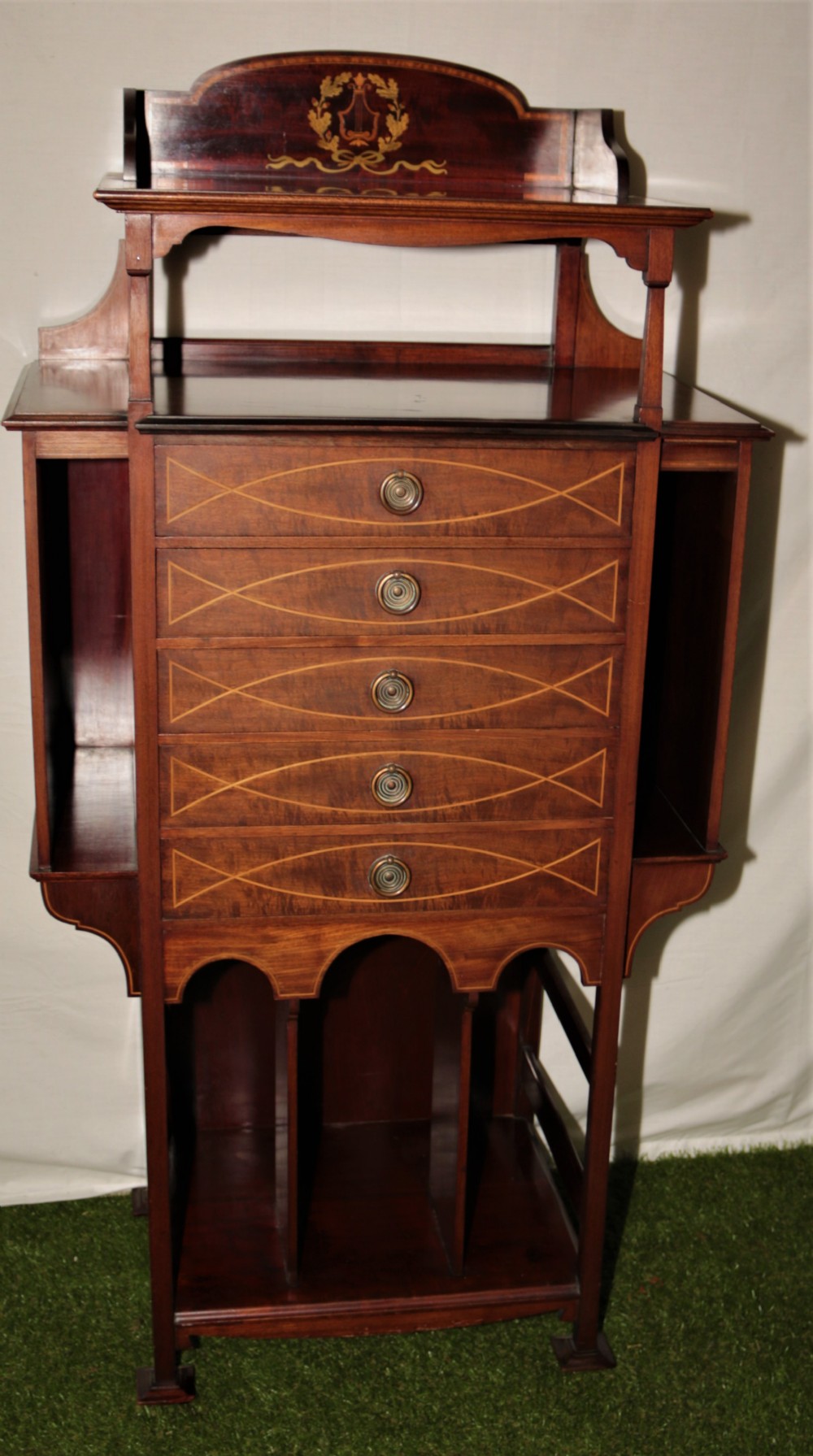 An Edwardian music cabinet/chest.