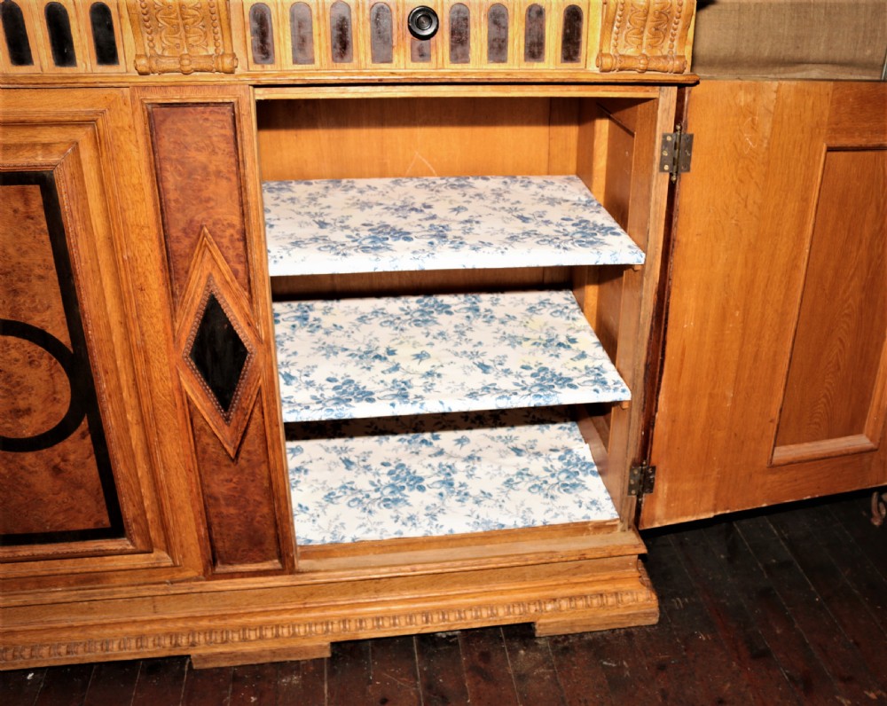 An oak Arts and Crafts sideboard. View VIII
