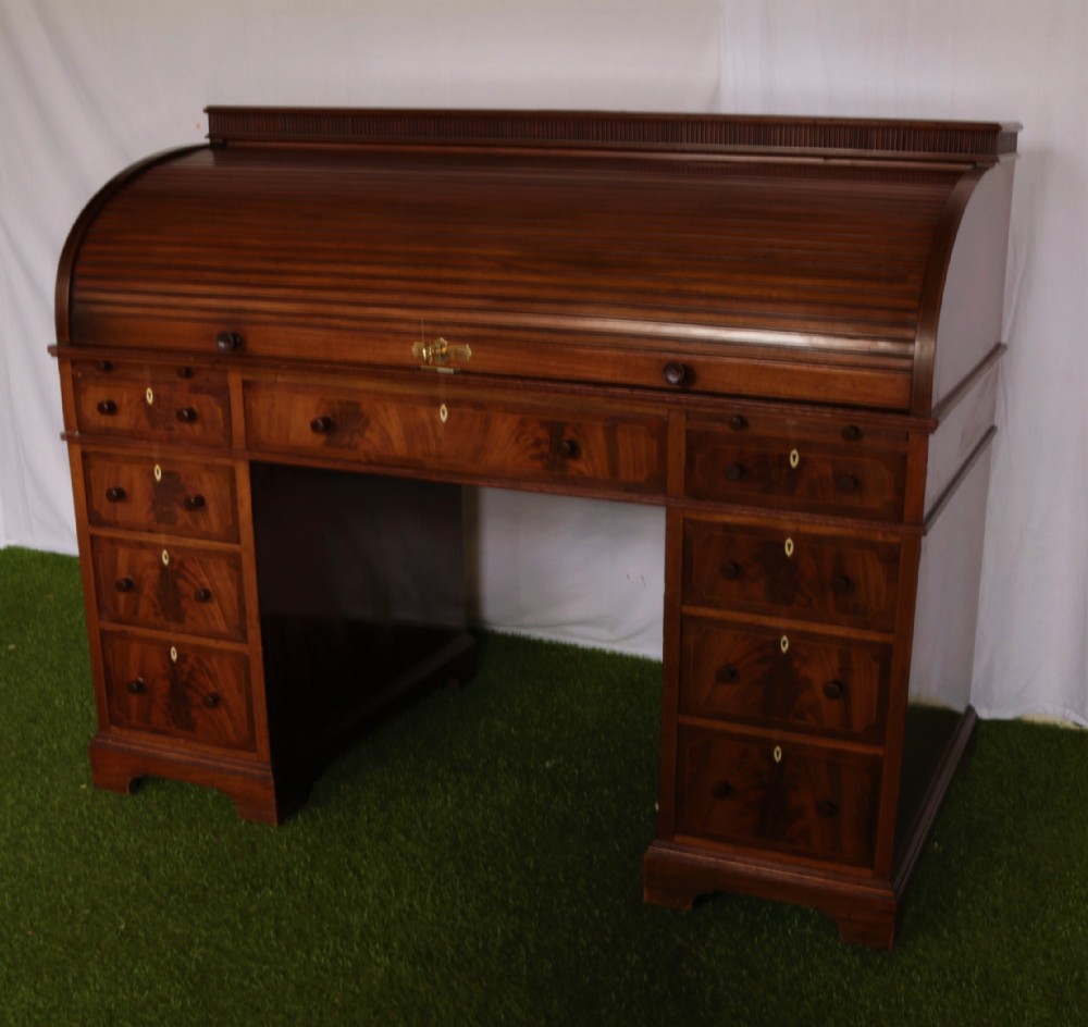 Mahogany cylinder top desk.