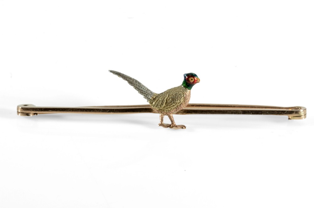 A Pheasant gold bar broach. View II
