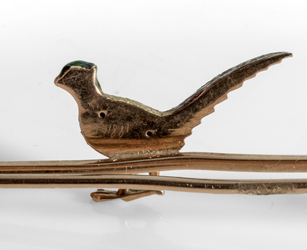 A Pheasant gold bar broach. View IV