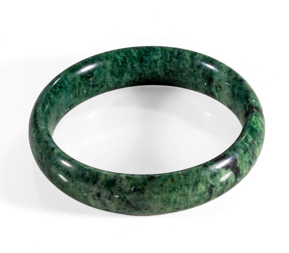 A spinach jade bangle.