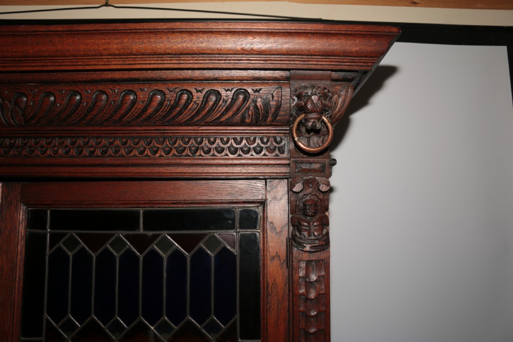 Carved oak bookcase View VIII