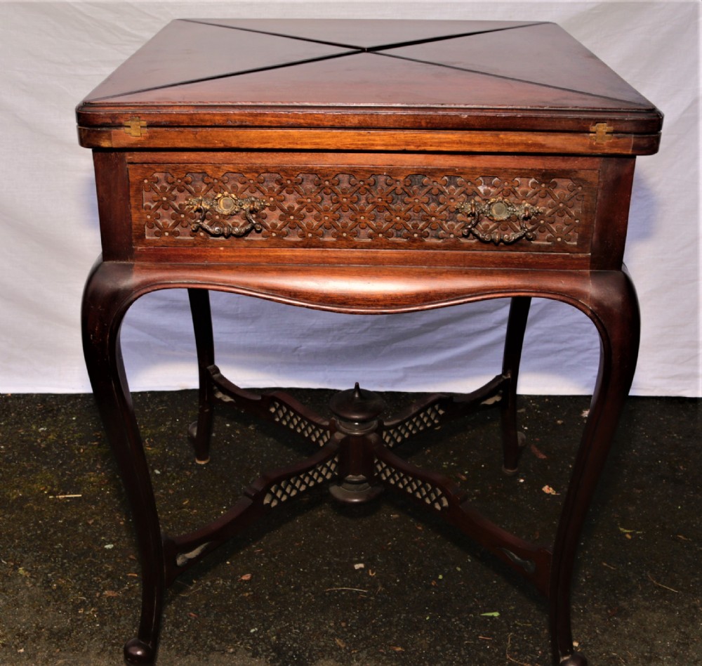 An Edwardian card table.