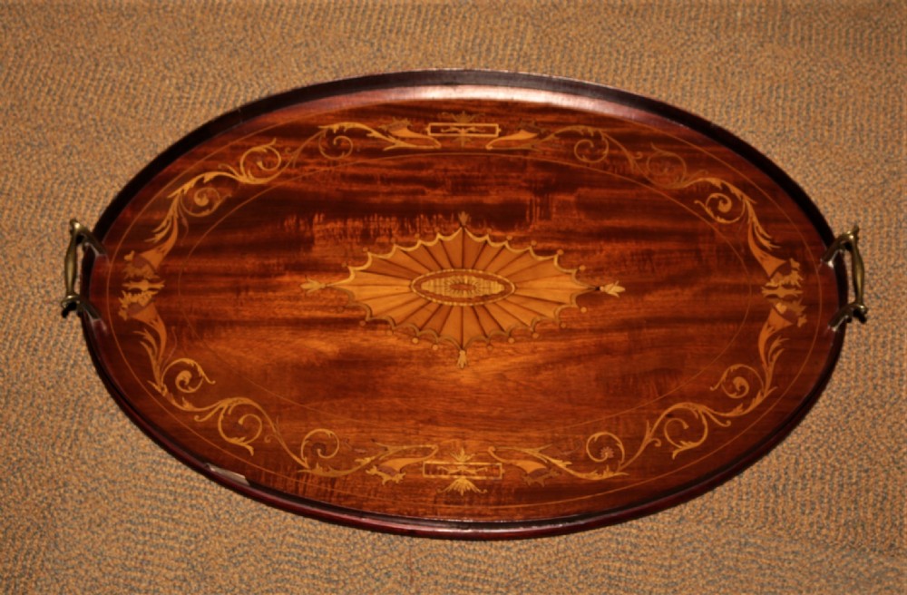 An Edwardian inlaid mahogany tray.