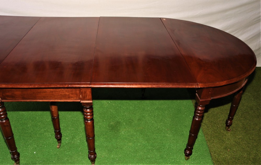 Georgian mahogany dining table. View IX