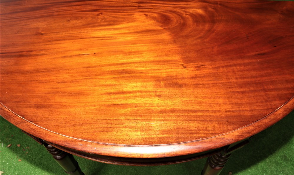 Georgian mahogany dining table. View XIV