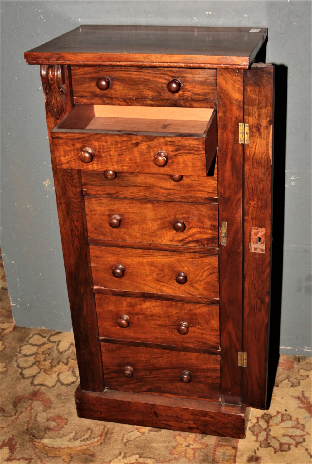 Rosewood Wellington chest.