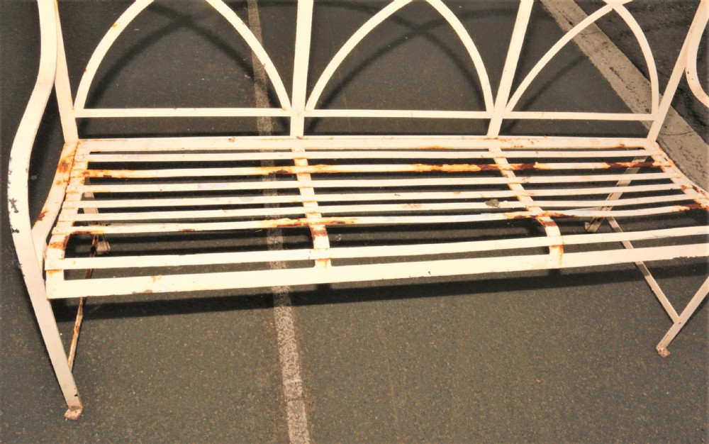 A pair of vintage iron garden benches View III
