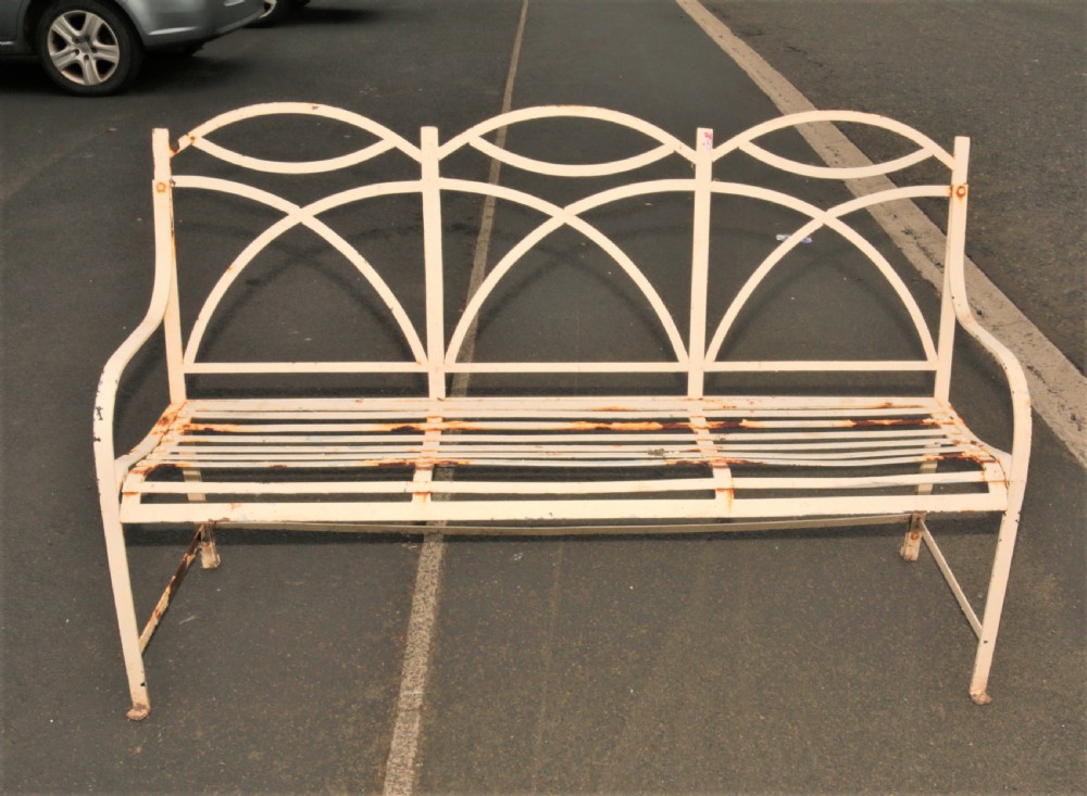 A pair of vintage iron garden benches View IV