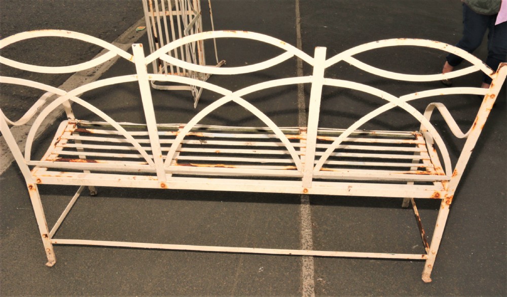 A pair of vintage iron garden benches View VII