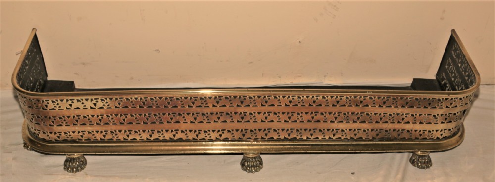 Victorian brass fire curb. View III