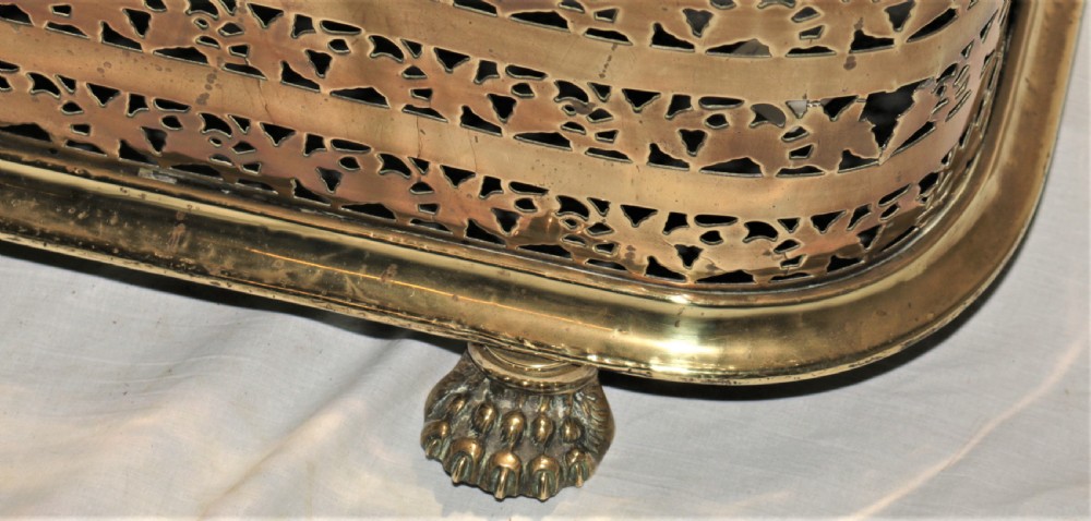 Victorian brass fire curb. View IV