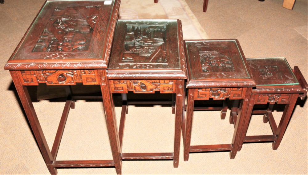 Nest of 4 Chinese tables.