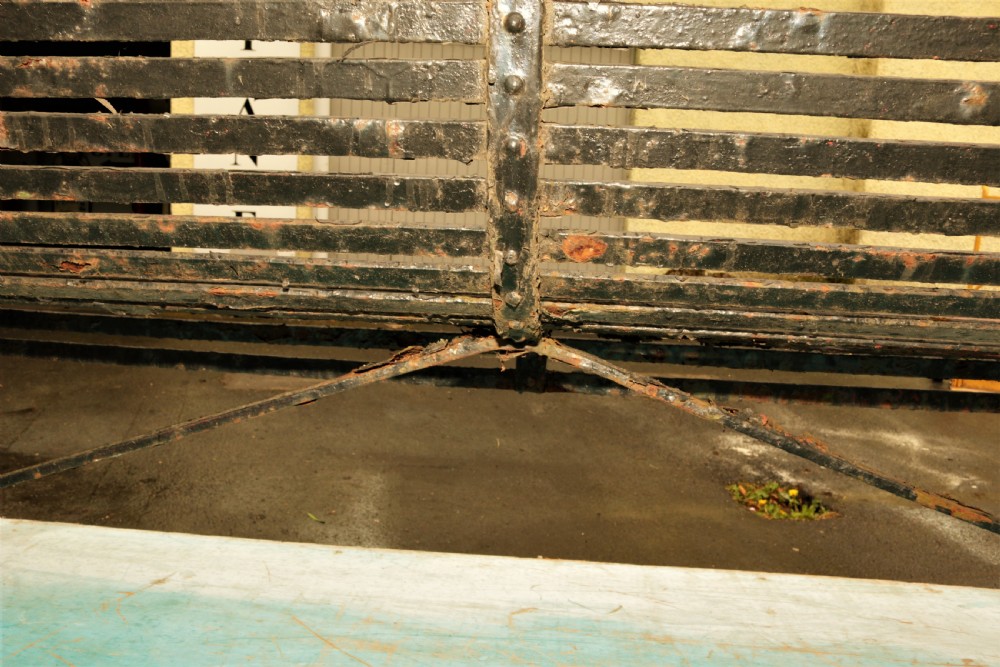 Heavy antique iron bench. View IV